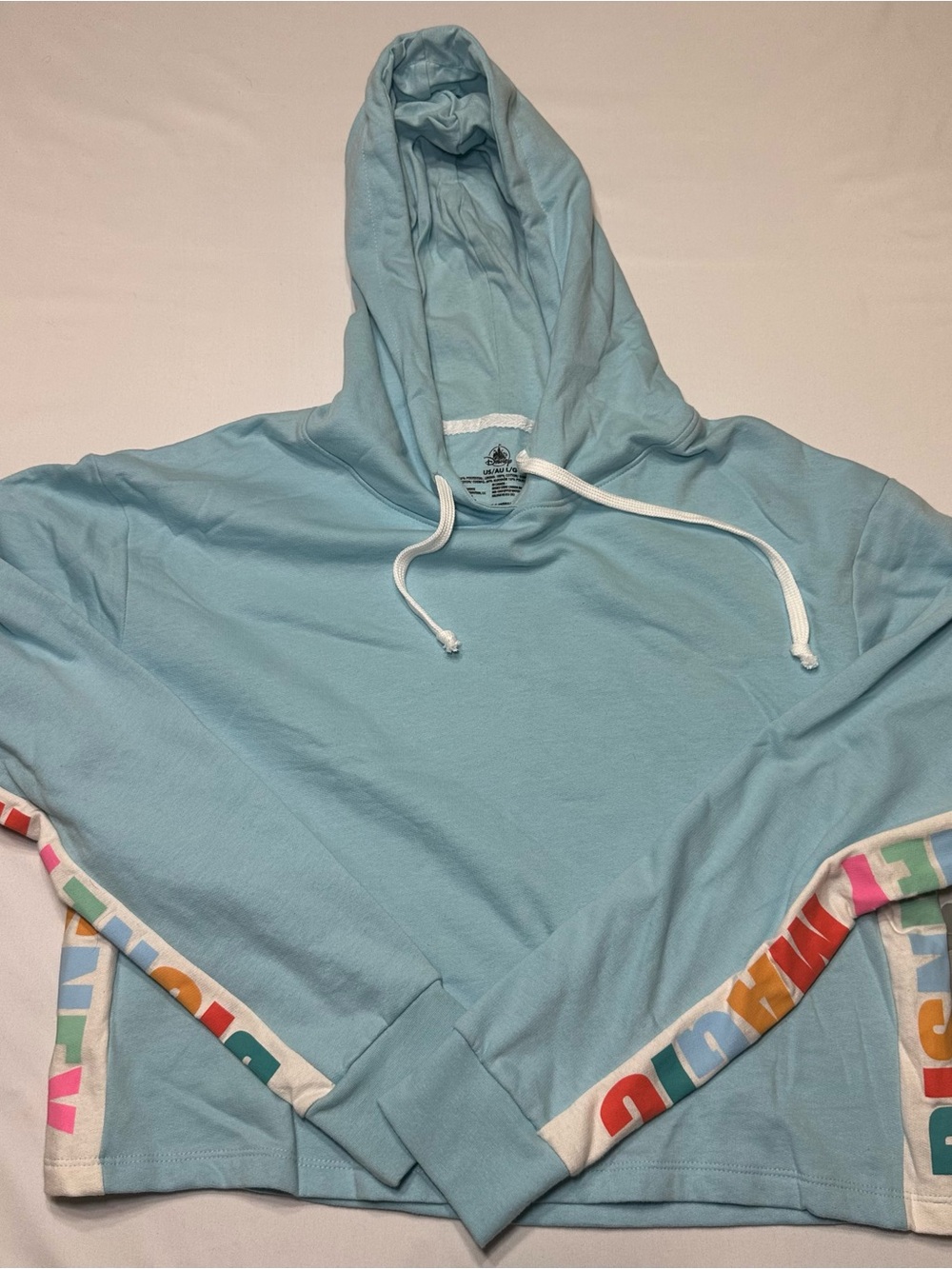 NWT Disney Parks Disney Magic Light Blue Cropped Hoodie L